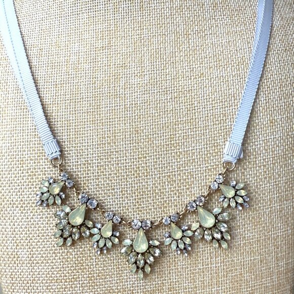 Statement Necklace With Rhinestone & Pale Yellow Gem Accents On Silver Ribbon - Picture 1 of 10